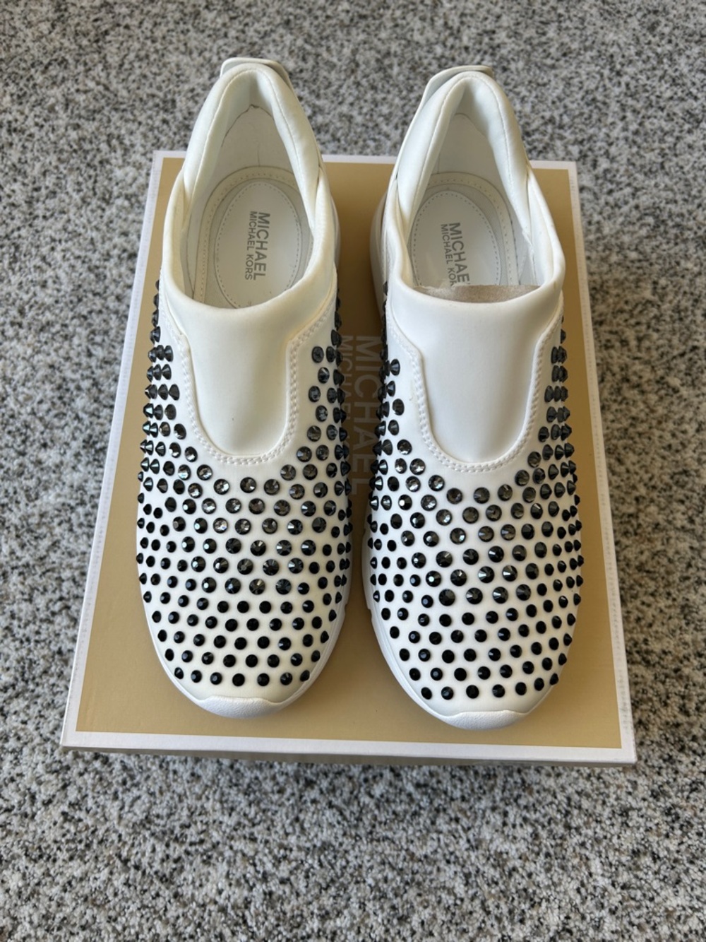 Michael Kors White Slip-On Sneakers with Black Stud Detailing